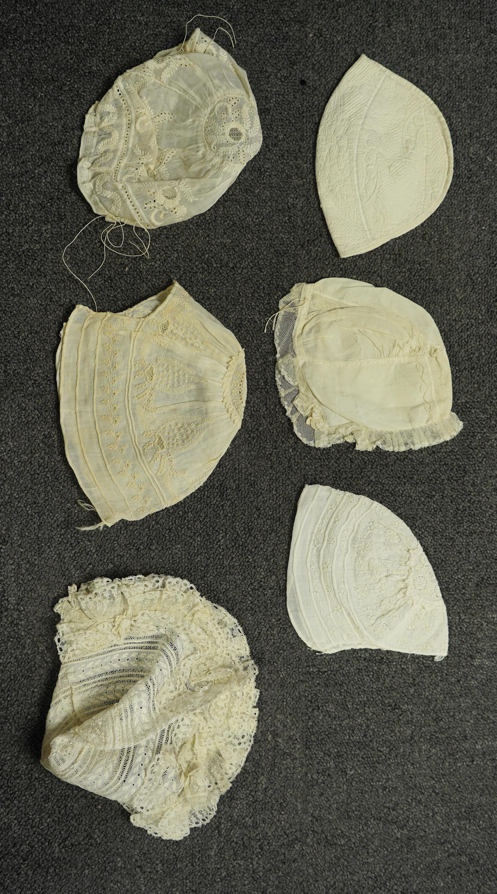 A collection of six baby’s bonnets from the mid 18th century to the late 19th century. An 18th century Hollie Point inserted baby bonnet, a quilted 18th century baby bonnet, two white work bonnets with needle lace crown